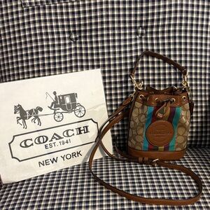 Coach Mini Dempsey bucket bag signature jacquard with stripes and patch